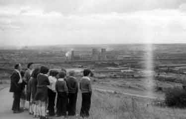 Children from St Joseph Home for Catholic Girls, Commonside, Walkley visiting Wincobank Hill showing (centre) Tinsley Cooling Towers and Tinsley Viaduct