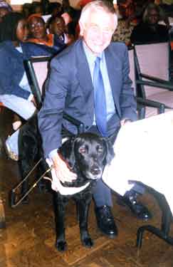 Unidentified person with guide dog