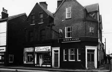 Horse and Jockey public house, No. 638 Attercliffe Road at the junction with (right) Baltic Road showing (centre) No. 642 Ye Olde Chocolate Shoppe and (left) No.644 Eric Waterall, pork butchers