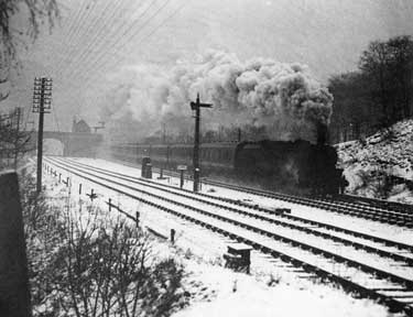 'Fighting the Blizzard' the Night Mail in Yorkshire snowstorm possibly passing Beauchief and Abbeydale Station