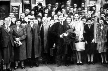 Unidentified group photograph outside local cinema