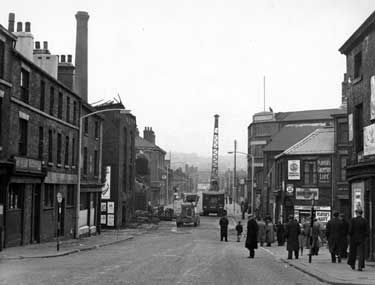 Premises being demolished on Corporation Street with junction with Spring Street off to the right 