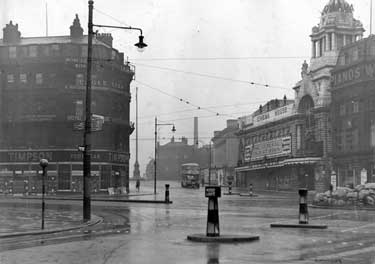 Timpson's footwear (left) and the Cinema House, Fargate (later renamed Barker's Pool) from Town Hall Square 