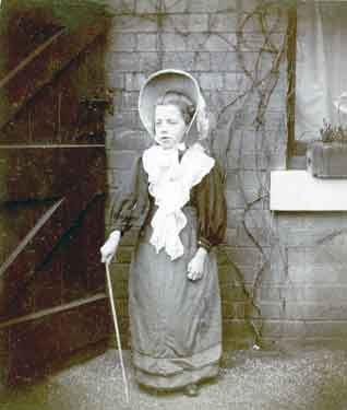 Dorothy Caroline Barr dressed up as Mother Hubbard, April 1908, outside No. 615 Ecclesall Road