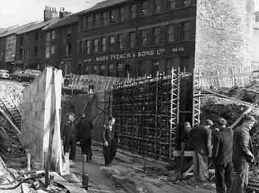 Construction of Charter Square subway showing Mark Tyzak and Sons Ltd, stampers and piercers, Nos 103-109 Carver Street