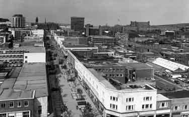 View of The Moor and its street market looking towards the City Centre and Park Hill Flats showing Cranes, pianos and organ dealers (foreground right)