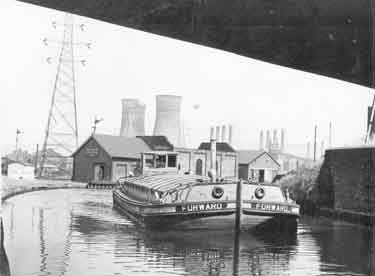 Canal barge on Sheffield and Tinsley Canal looking towards Blackburn Meadows Power Station.