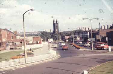 Roundabout on St. Mary's Gate at junction with (right) London Road showing (centre) St. Mary's C. of E. Church, Bramall Lane
