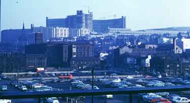 View of Corn Exchange car park and Broad Street showing (back) the construction of Hyde Park Flats