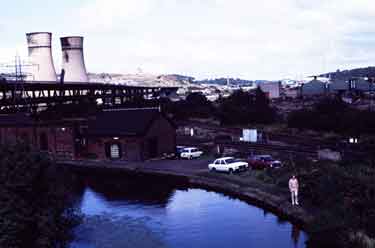 View of the Sheffield and South Yorkshire Navigation showing (left) the Tinsley Cooling Towers and M1 motorway