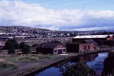 View of Wincobank Hill from Sheffield and South Yorkshire Canal  showing (centre) the site of the former Hadfields Co. Ltd., East Hecla Steelworks later to become Meadowhall Shopping Centre