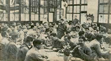 Another council school as a military hospital. Christmas with the wounded in the Greystones military hospital, which, until recently, was the Greystones Council School. The men here are enjoying Christmas fare. 