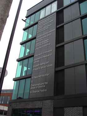 Poem entitled 'A Place with no Pain' by Chantwriters and the people of Sharrow, commissioned for the Sharrow Festival, on the side wall of London Court, student accommodation, junction of Beeley Street and London Road