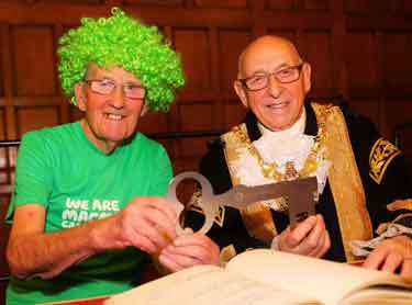 John Burkhill, known as the 'Man with the Pram' receiving the freedom of the city with Lord Mayor, Councillor Tony Dowling