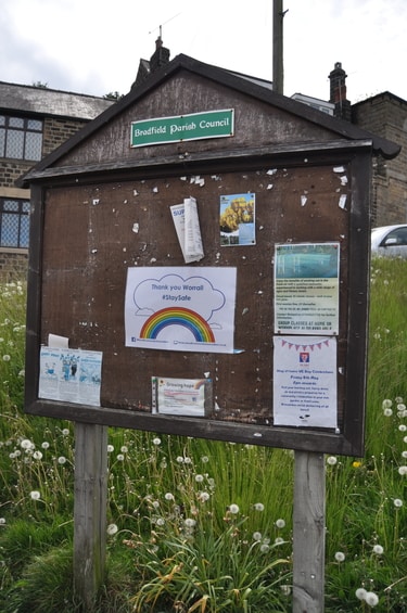 Parish Council noticeboard, including a covid-19 pandemic sign 'Thank you Worrrall #stay safe'
