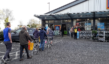 Covid-19 pandemic: queuing to get into the Aldi supermarket, Archer Road