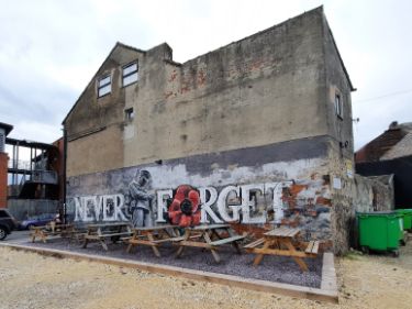Street art: Never Forget by Mace, Burton Road at junction with Harvest Lane, Neespend