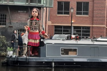 Little Amal arriving at Sheffield Canal Basin
