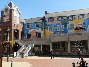Shops in Orchard Square showing (left) Nos. 24 - 26 Waterstone's book shop and (right) Nos. 2 - 3 Costa Coffee