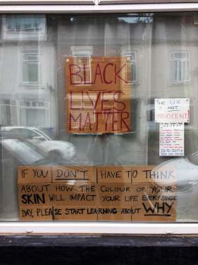Black Lives Matter - protest material in window, Sheffield