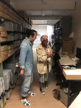 Sile Sibanda (BBC Radio Sheffield) and Yuen Fong Ling (artist, curator, researcher and lecturer at Sheffield Hallam University) pictured in the strongroom, Sheffield City Archives