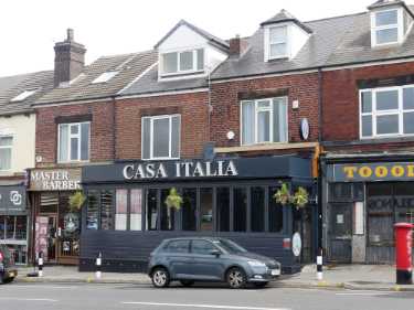 Chesterfield Road showing No. 113 Master Barber; Nos. 115 -117 Casa Italia, Italian restaurant and No. 119 Toools, new and second hand tools