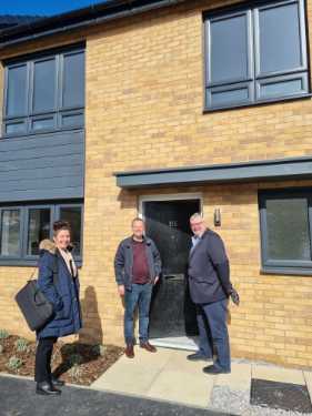 Councillor Terry Fox (right) and housing officers visiting new Shared Ownership Scheme homes at Owlthorpe