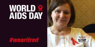 Sheffield City Council Leader, Julie Dore, wearing her red ribbon on World Aids Day 