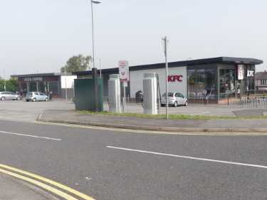 Richmond Park Road showing (left) No. 163 Costa Coffee and No.165 Kentucky Fried Chicken (KFC), takeaway