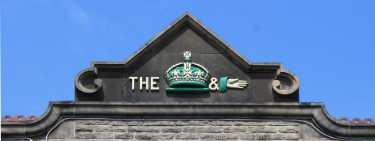 Inn sign for the Crown and Glove public house, No. 96 Uppergate Road, Stannington