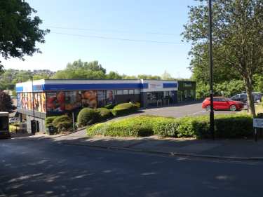 Tesco Express supermarket, No. 455 Abbeydale Road and junction with (foreground) Bedale Road