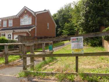 Poster on Cardwell Avenue at the entrance to Cardwell Drive open space and playground protesting against City Council plans to build 1,600 houses on farmland on Green Belt land between Handsworth and Woodhouse