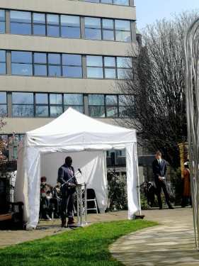 Speaker at Covid Memorial Day, 2025 in Balm Green Gardens showing (right) Councillor Tom Hunt, Leader of the Council