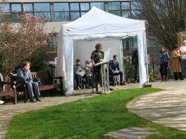 Speaker at Covid Memorial Day, 2025 in Balm Green Gardens