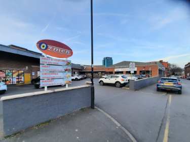 Ozmen Extra supermarket, Nos. 55 - 57 John Street