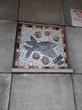 Wall mosaic (based on Luke 9:16, loaves and fish), Parish hall and church office, All Saints C. of E. Church, Ringinglow Road, Ecclesall
