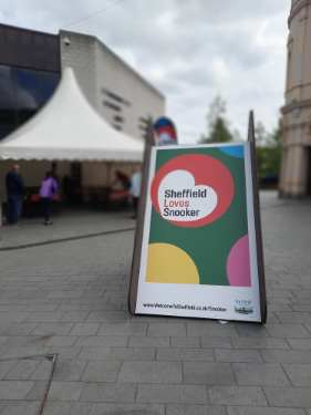 Snooker billboard titled 'Sheffield loves Snooker' in the Snooker Village during the World Snooker Championships, Crucible Theatre, Tudor Square