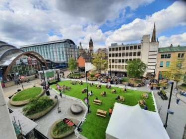 Snooker Village during World Snooker Championships, Crucible Theatre, Tudor Square showing (left) Winter Garden, (centre) St Paul Mecure Hotel and (right) Head of Steam public house