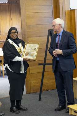Graham Dawson of Sheffield Philharmonic Chorus presenting artwork (previously donated to the choir in Bochum) to Lord Mayor of Sheffield, Councillor Safiya Saeed