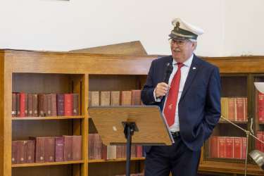 Alan Brentnall of Unite the Union Brass Band speaking at the Sheffield Central Library at the launch of an exhibition celebrating 75 Years of the Twinning of Sheffield and Bochum, Germany