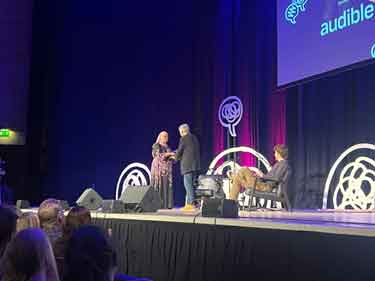 Lord Mayor of Sheffield, Councillor Safiya Saeed presenting an award to Sir Michael Palin at the Crossed Wires [Podcast] Festival