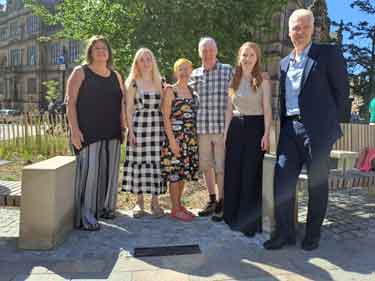 Plaque honouring Percy Riley, a Sheffield fundraiser, unveiled in its new permanent home at the top of Fargate