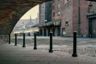 View of the Straddle Warehouse and Terminal Warehouse looking from the pedestrian entrance Sheffield Canal Basin (later Victoria Quays), Furnival Road
