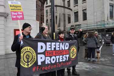 Banner at the demonstration against Racism and in support of refugees, Tudor Square showing (back right) the rear of the Central Library