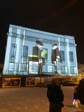 Light show projecting Pete McKee art work onto the Central Library, Tudor Square