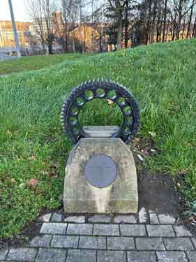 Gear wheel and plaque erected in memory to Sir Ron Ironmonger, former Leader of Sheffield City Council and South Yorksire County Council, Park Square