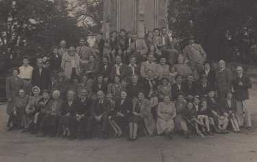 Sheffield Channel Islands Society outing to Ilam, Staffordshire, with members pictured at the foot of Ilam Cross, [c. 1944]
