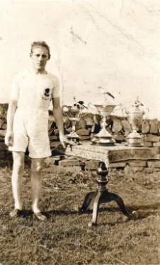 Unidentified athlete with trophies