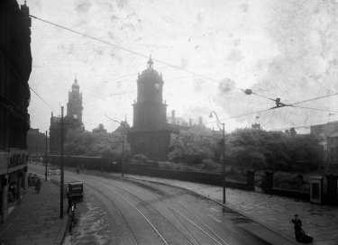 Pinstone Street, showing St. Paul's C. of E. Church prior to demolition, and the Town Hall