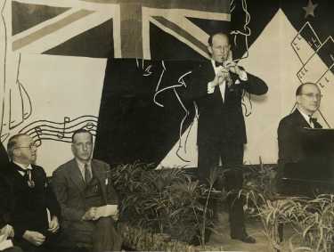 Lord Mayor, Councillor Samuel Hartley Marshall JP (1st left) attending a classical music concert by the oboe player, Leon Goossens (1897-1988) at the Brincliffe Oaks Hotel, No. 9 Oak Hill Road, Nether Edge